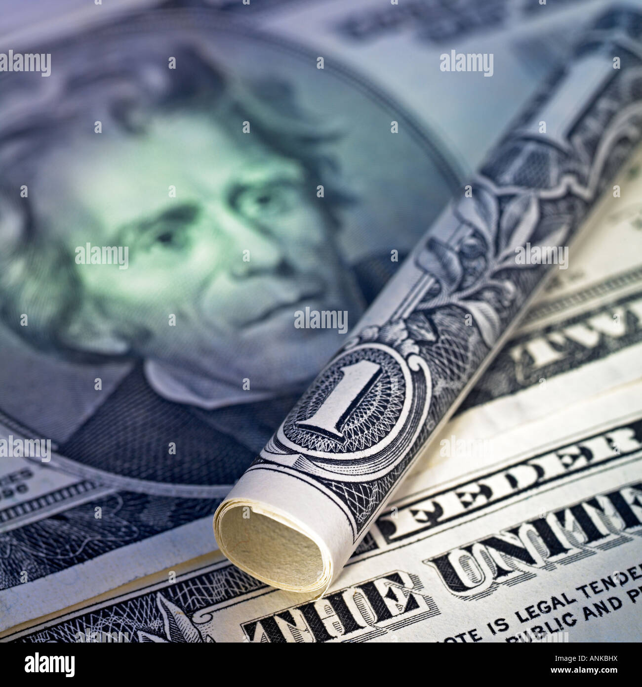 One US dollar banknote rolled up Stock Photo - Alamy