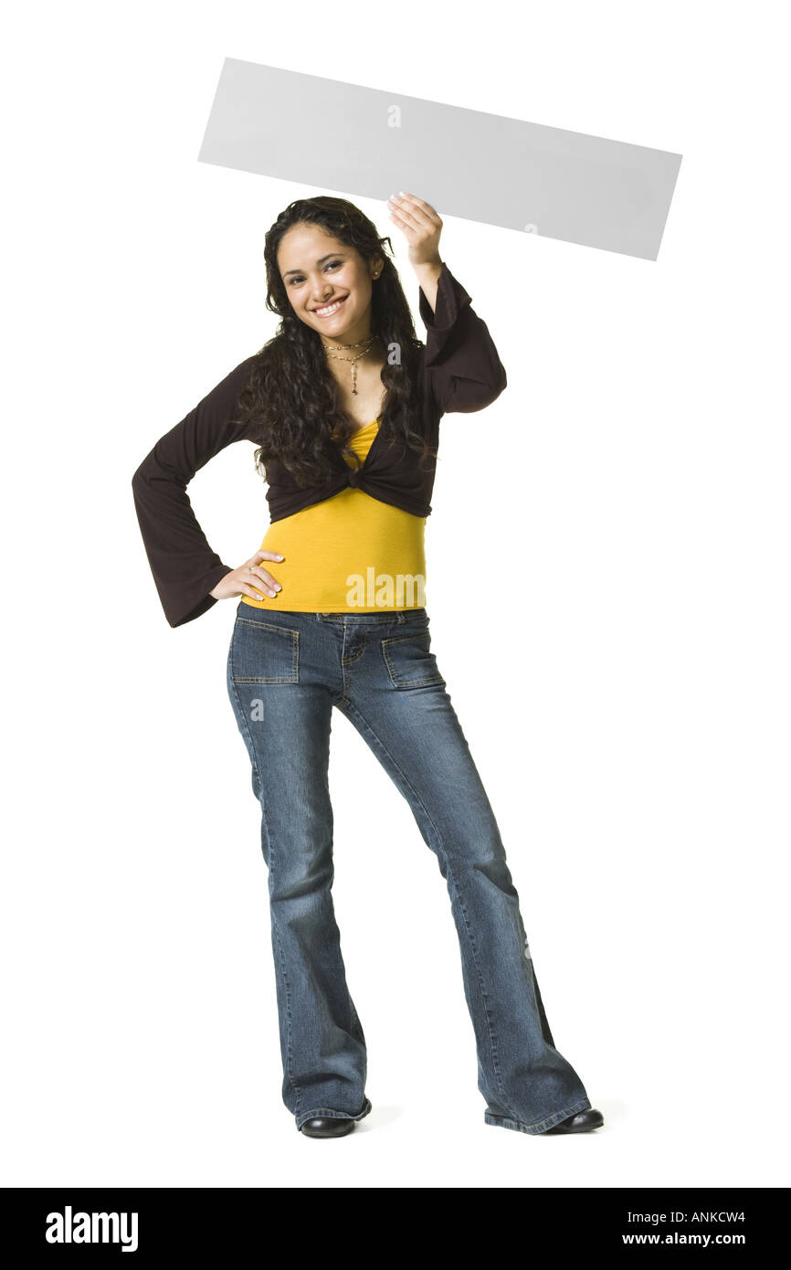 Portrait of a young woman holding a blank sign Stock Photo - Alamy