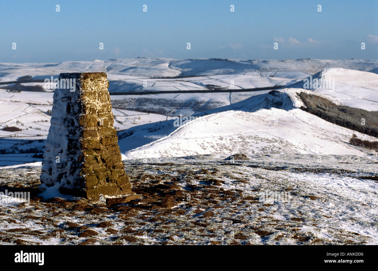 PICTURE CREDIT Doug Blane Snow on Mam Tor trig point ridge Peak District National Park Derbyshire Stock Photo