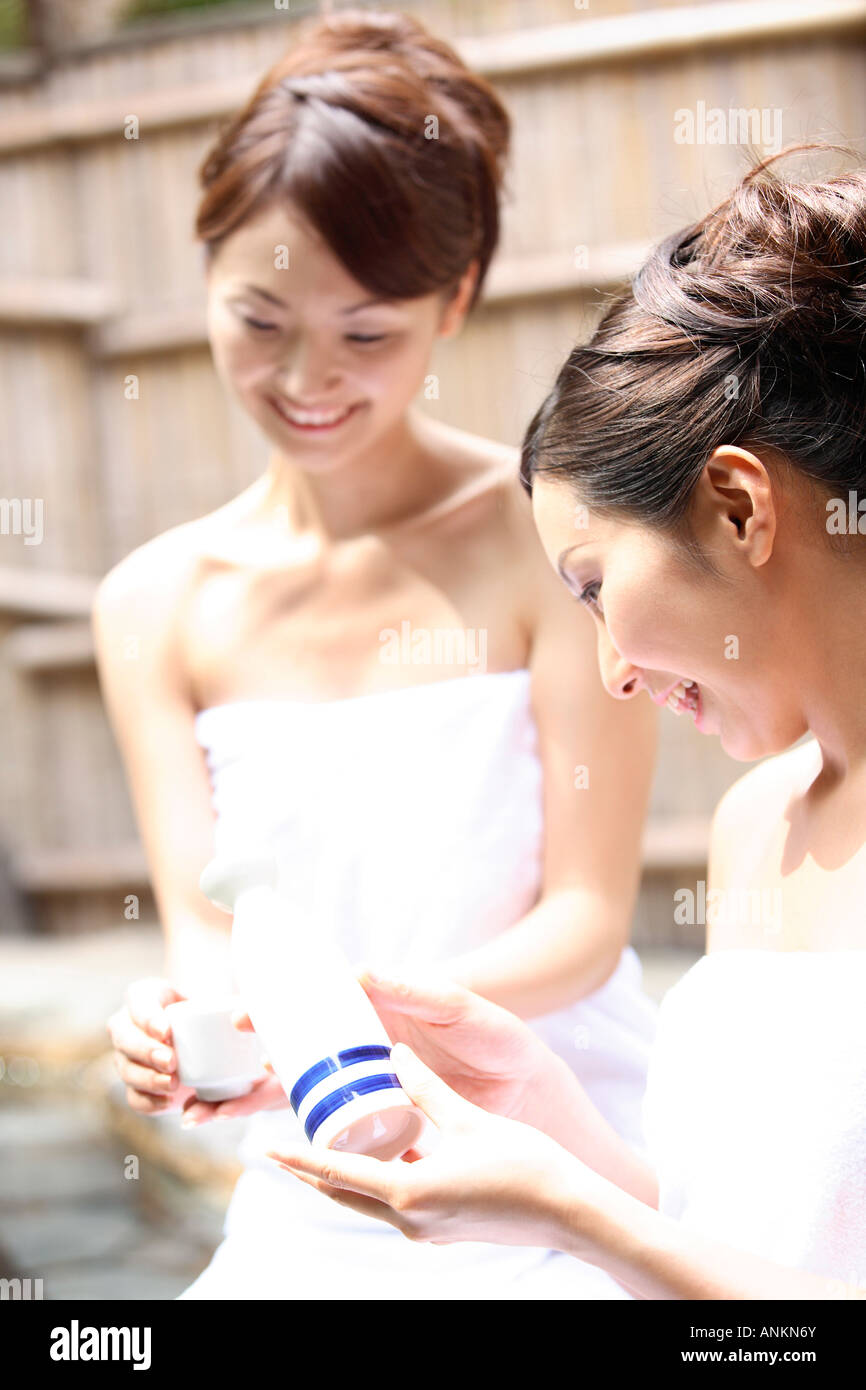 Japanese Women Drinking Sake In A Open Air Bath Stock Photo Alamy