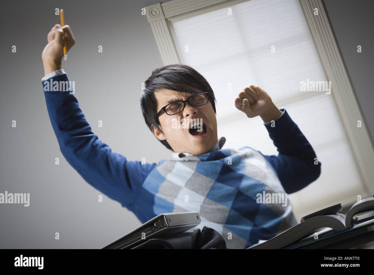 Young asian man stretching hi-res stock photography and images - Alamy