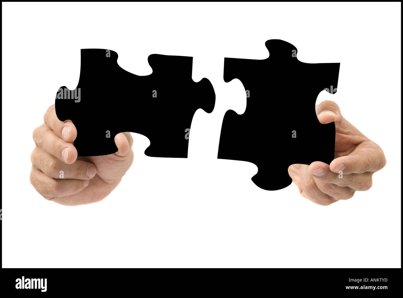 Fixing jigsaw puzzle hi-res stock photography and images - Alamy