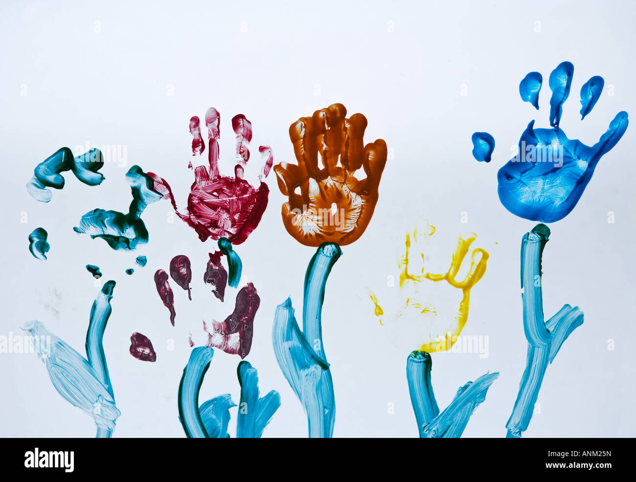 Children's handprints create flowers Stock Photo