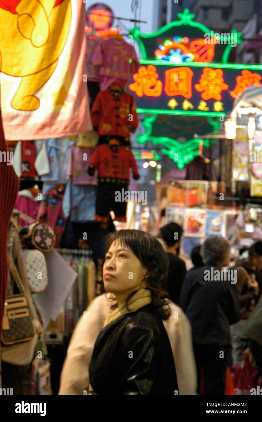 Temple street night market chinese woman hong kong hi-res stock ...