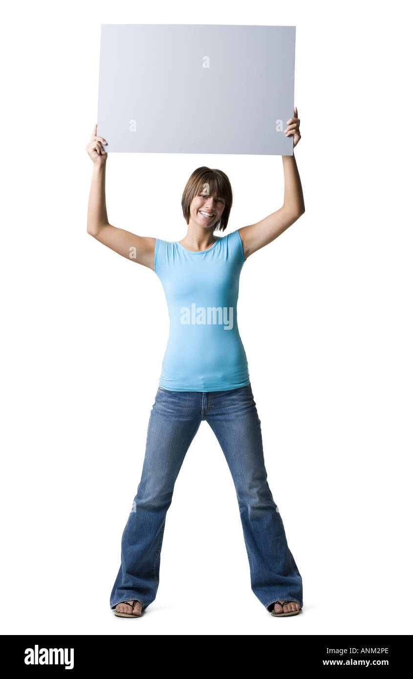 Portrait of a teenage girl holding a blank sign Stock Photo - Alamy