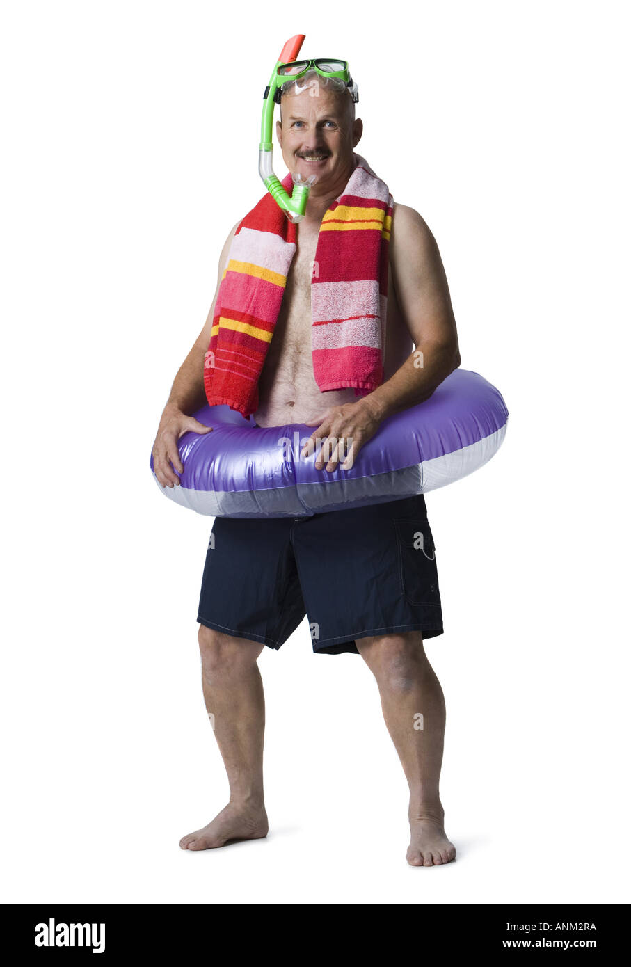 Portrait of a man standing with an inflatable ring around his waist