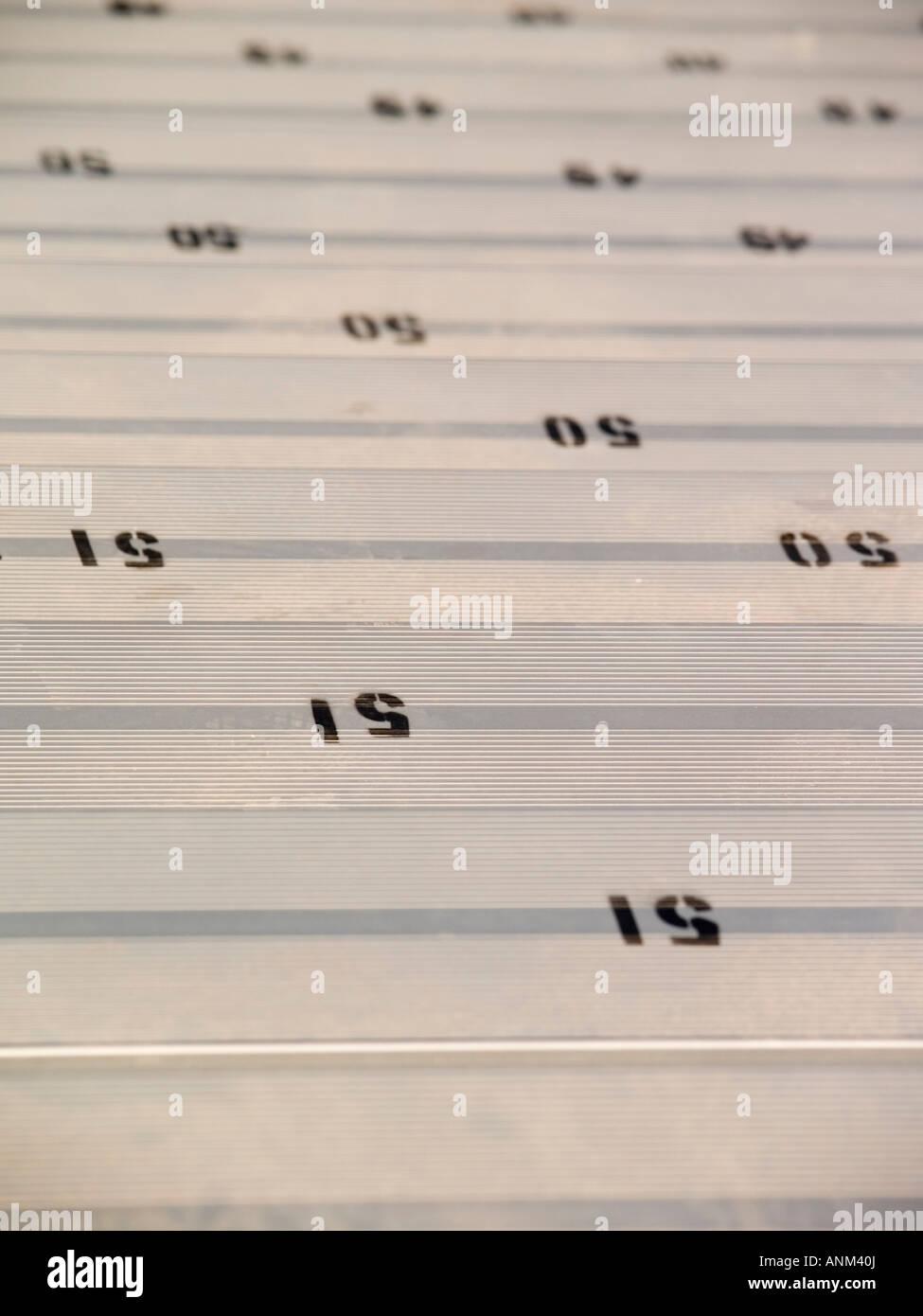 Numbered seats on aluminum grandstand seats Stock Photo