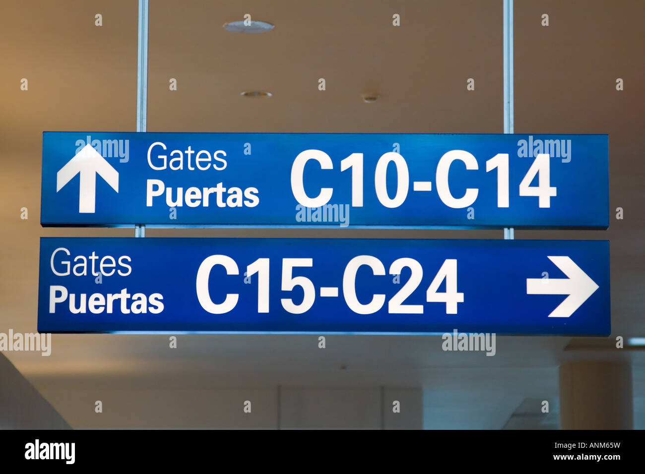 Airport directional signs in the terminal for passengers to find their