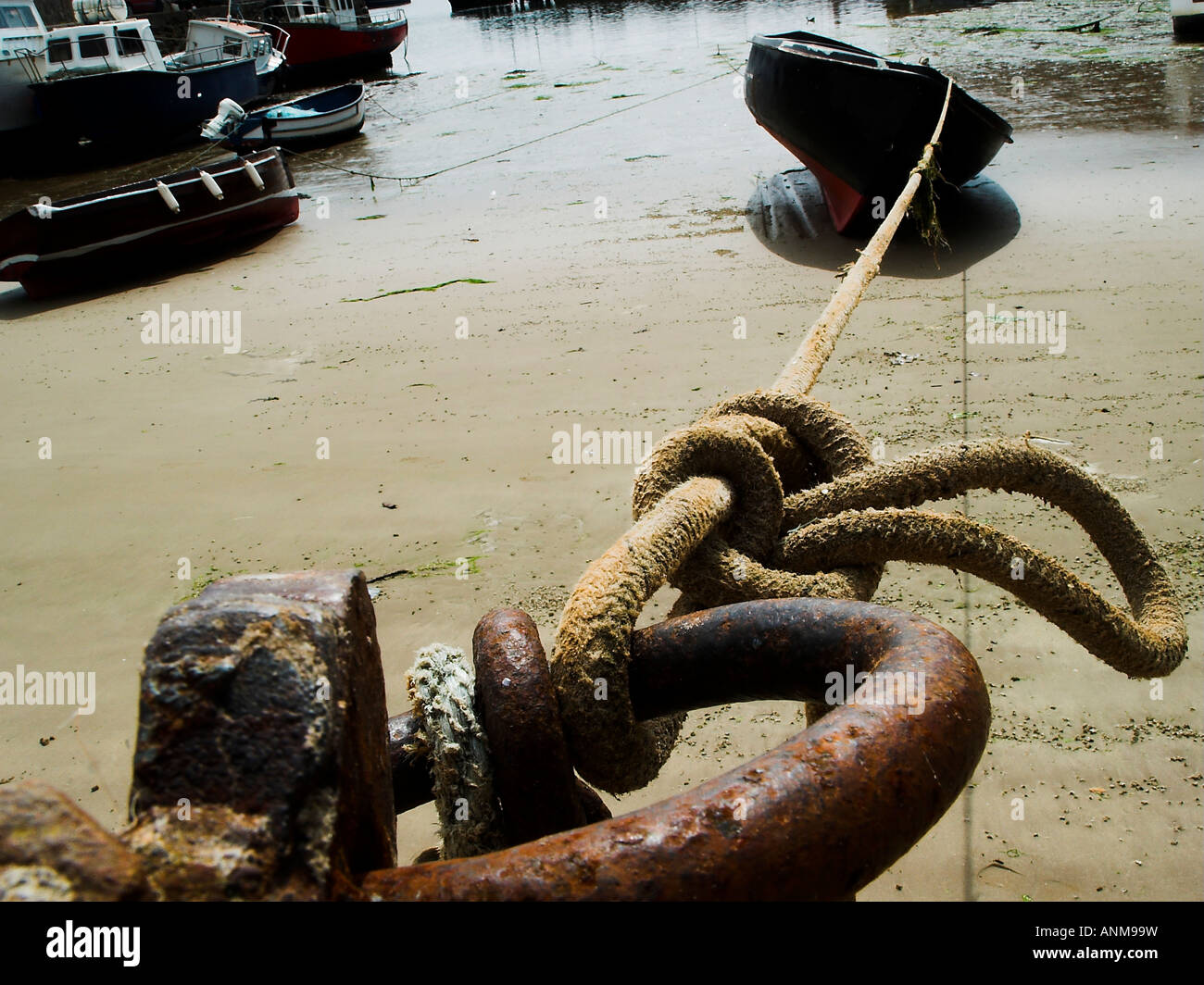 Fishing boat tied to pier hi-res stock photography and images - Alamy