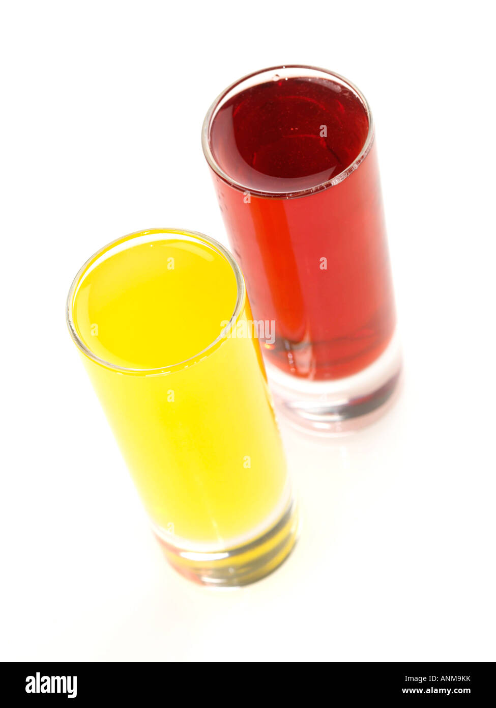 Fruit squash orange blackcurrent juice glass glasses hires stock