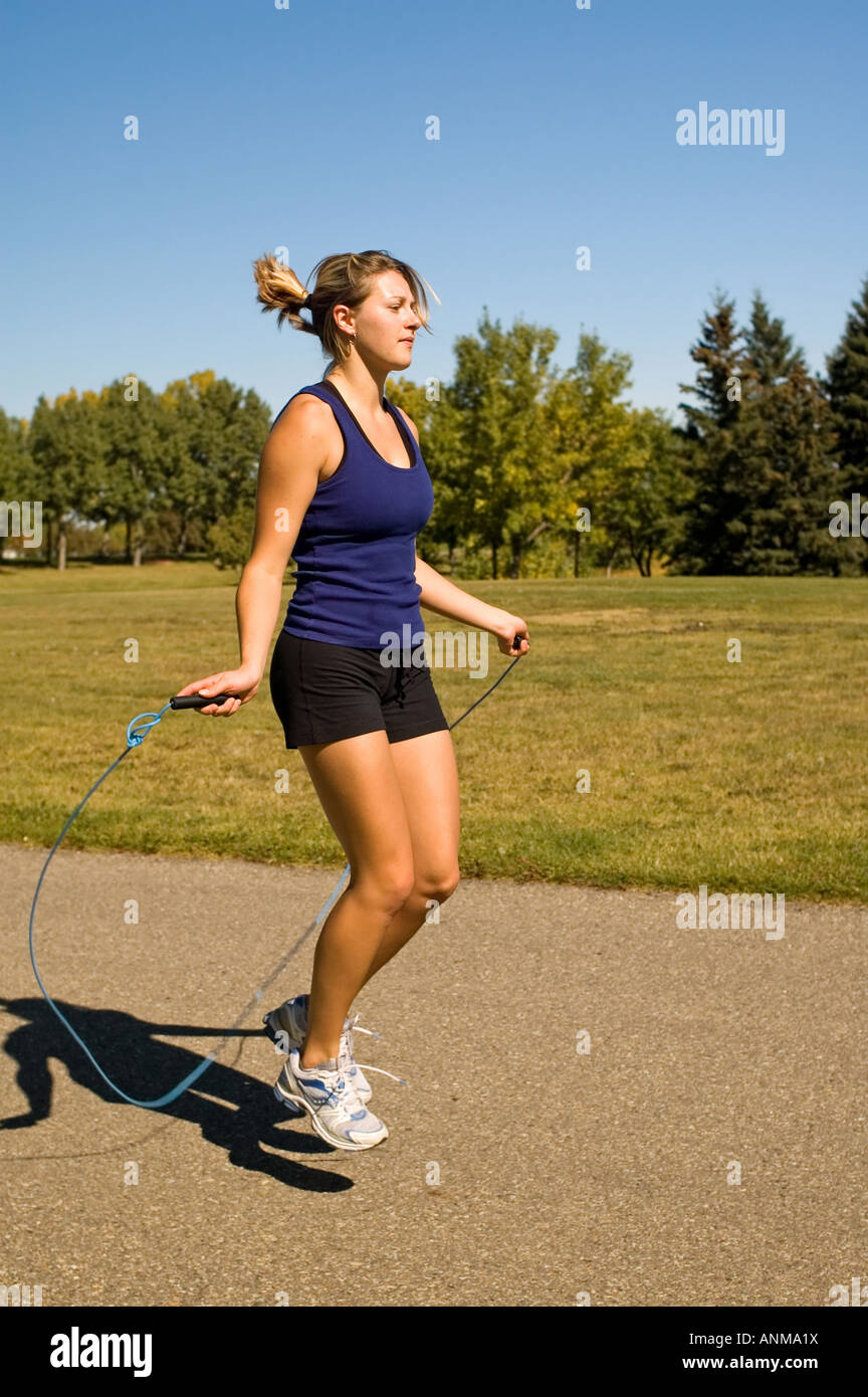Cute woman skipping rope hi-res stock photography and images - Alamy