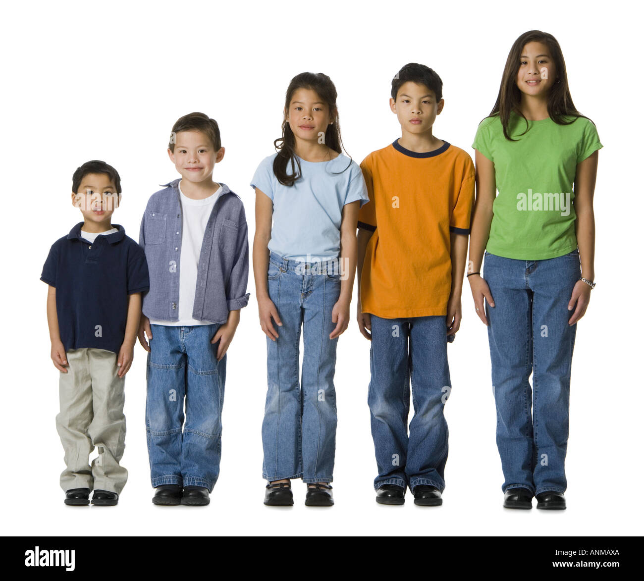 Portrait of five children standing in a row Stock Photo