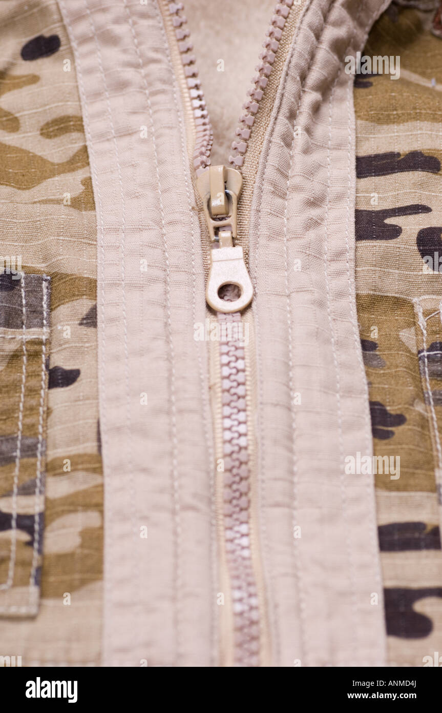 Zipper of a military camouflaged jacket Stock Photo Alamy