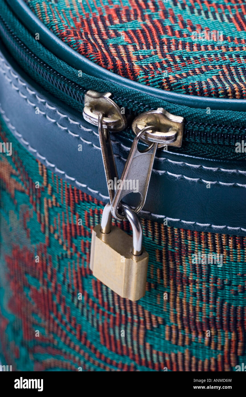 Travel case zipper locked with padloc Stock Photo