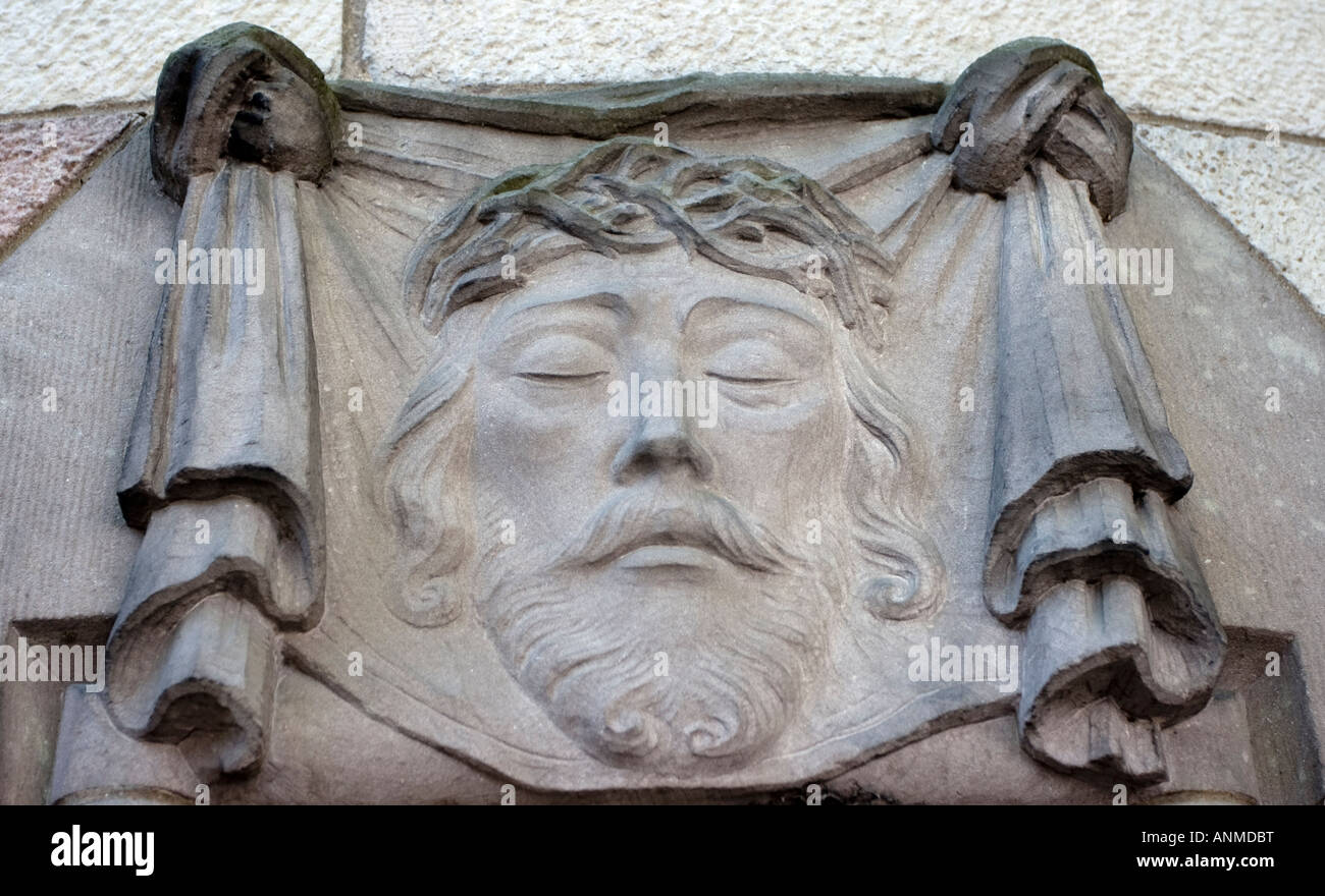 Stone bas relief face of Jesus on Sacred Heart Church (Herz Jesu Kirche ...