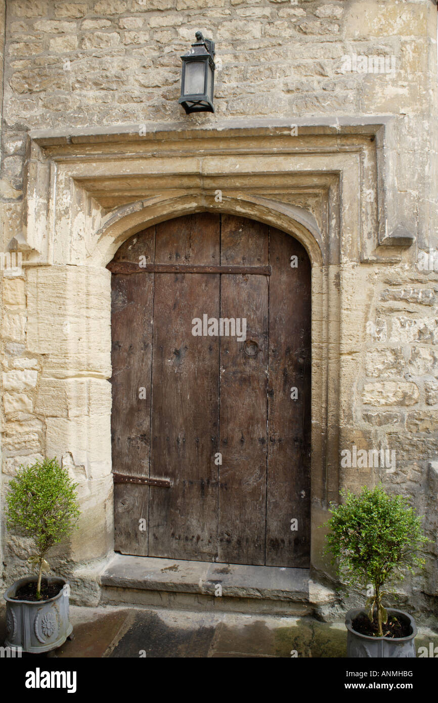 UK. An ancient studded wood entrance door. Stock Photo