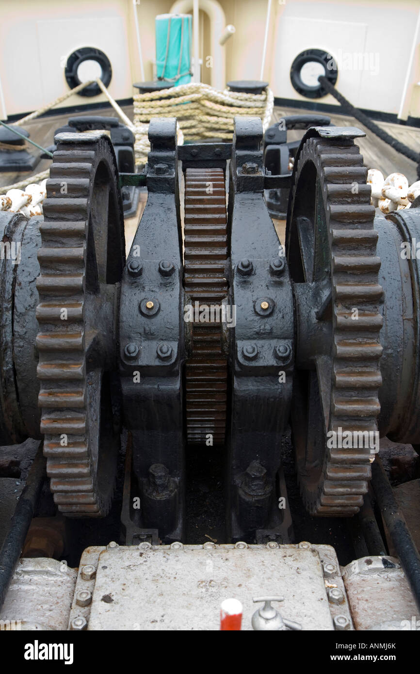 Gear wheels of a steam powered winch onboard ship Stock Photo Alamy