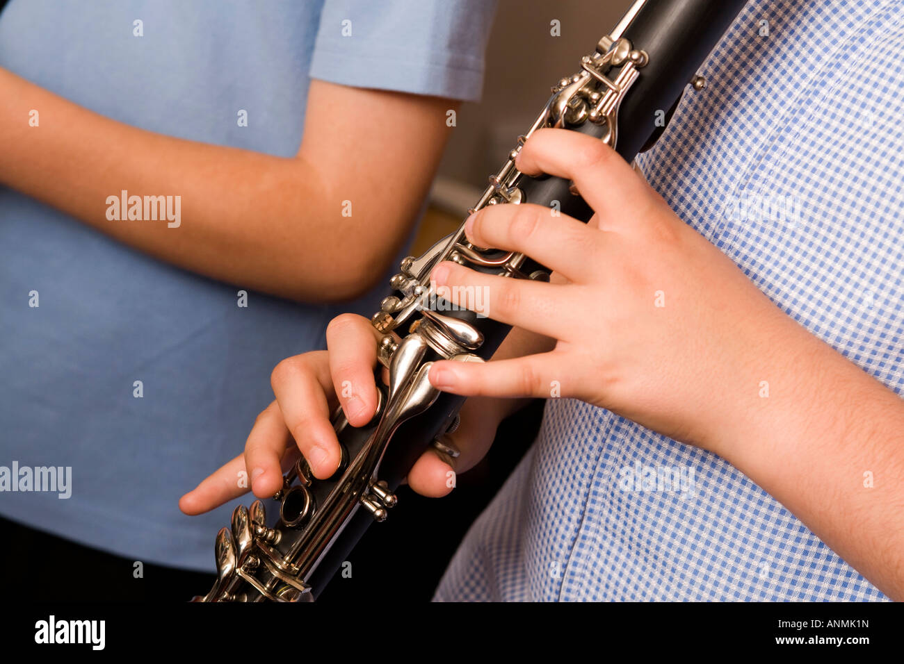 education hand of child playing in school band Stock Photo Alamy