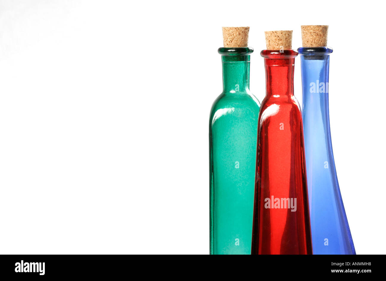 Green red blue glass bottles Stock Photo