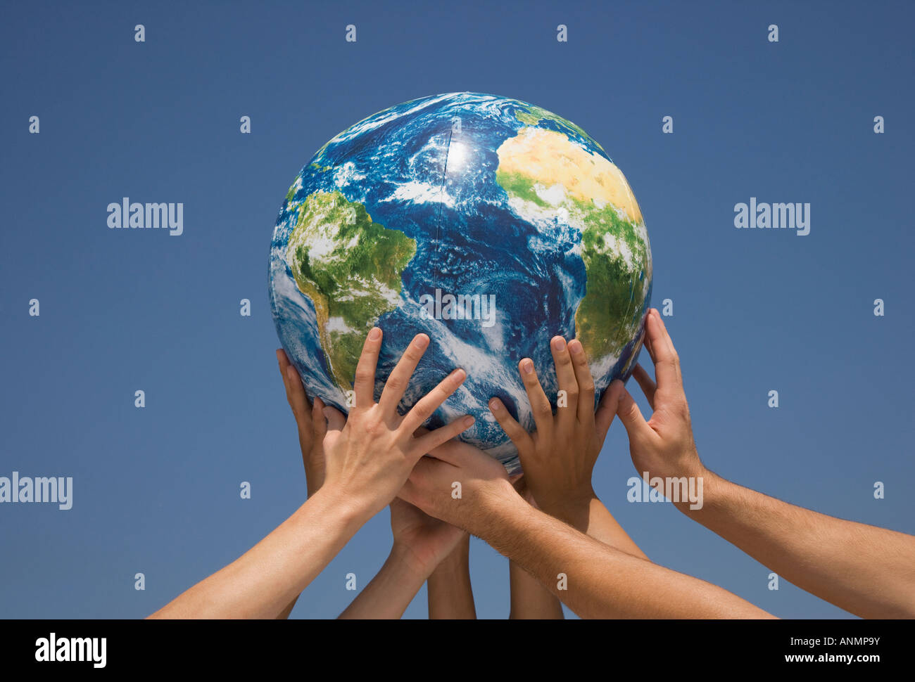 Hand globe sculpture hi-res stock photography and images - Alamy