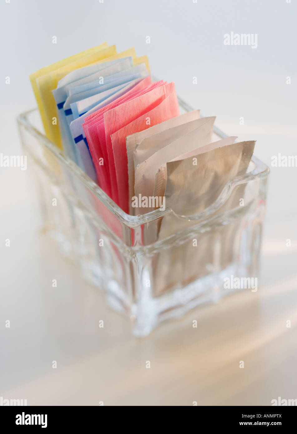 Close up of sugar and sweetener packets Stock Photo