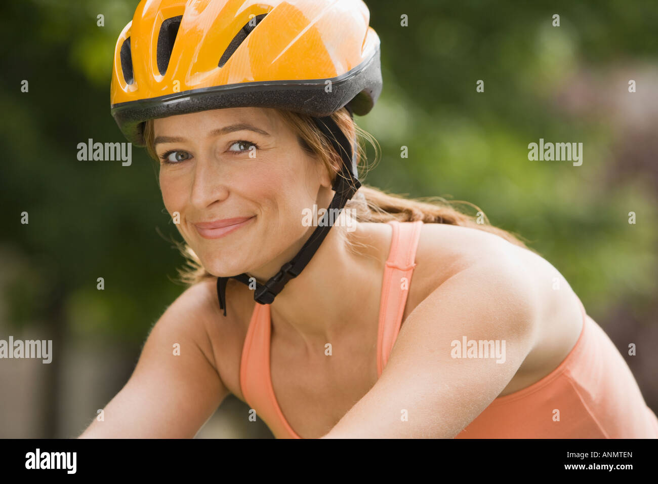Active woman in helmet hi-res stock photography and images - Alamy