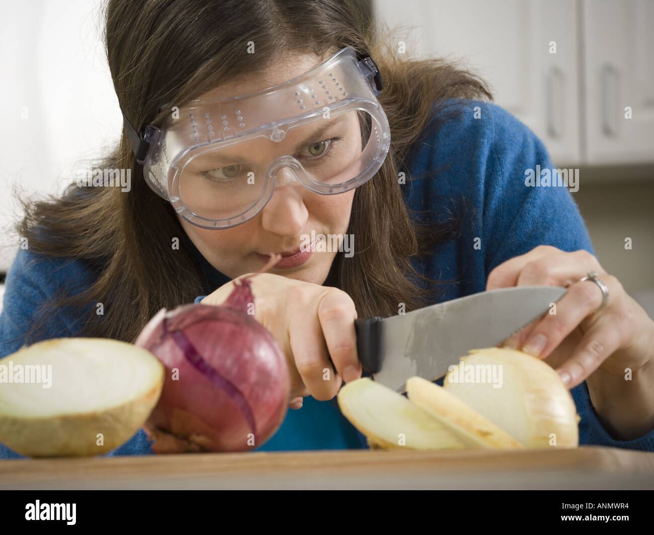 Cutting onion crying hi-res stock photography and images - Alamy