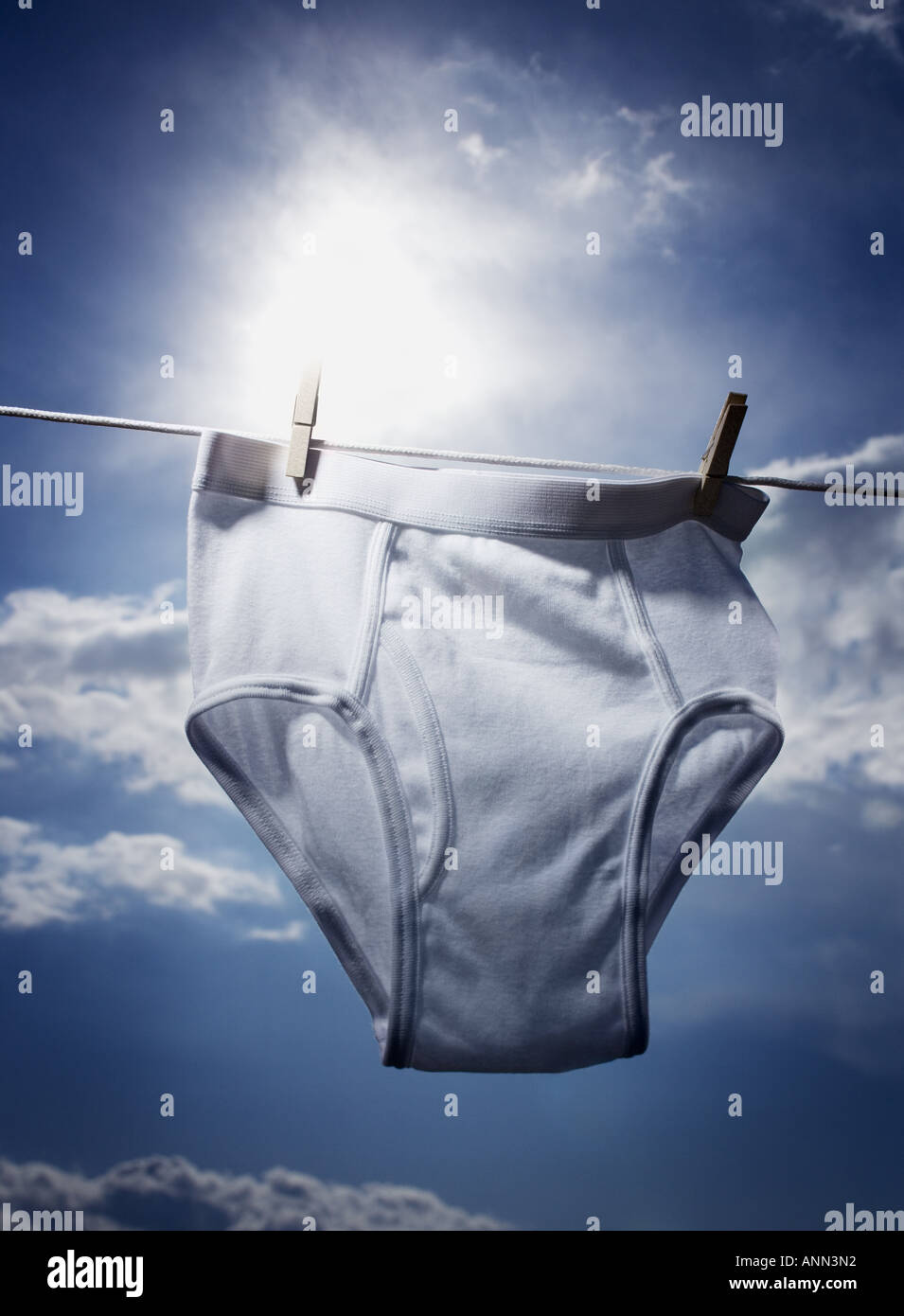 https://c8.alamy.com/comp/ANN3N2/close-up-of-a-mens-underwear-hanging-on-a-clothesline-ANN3N2.jpg