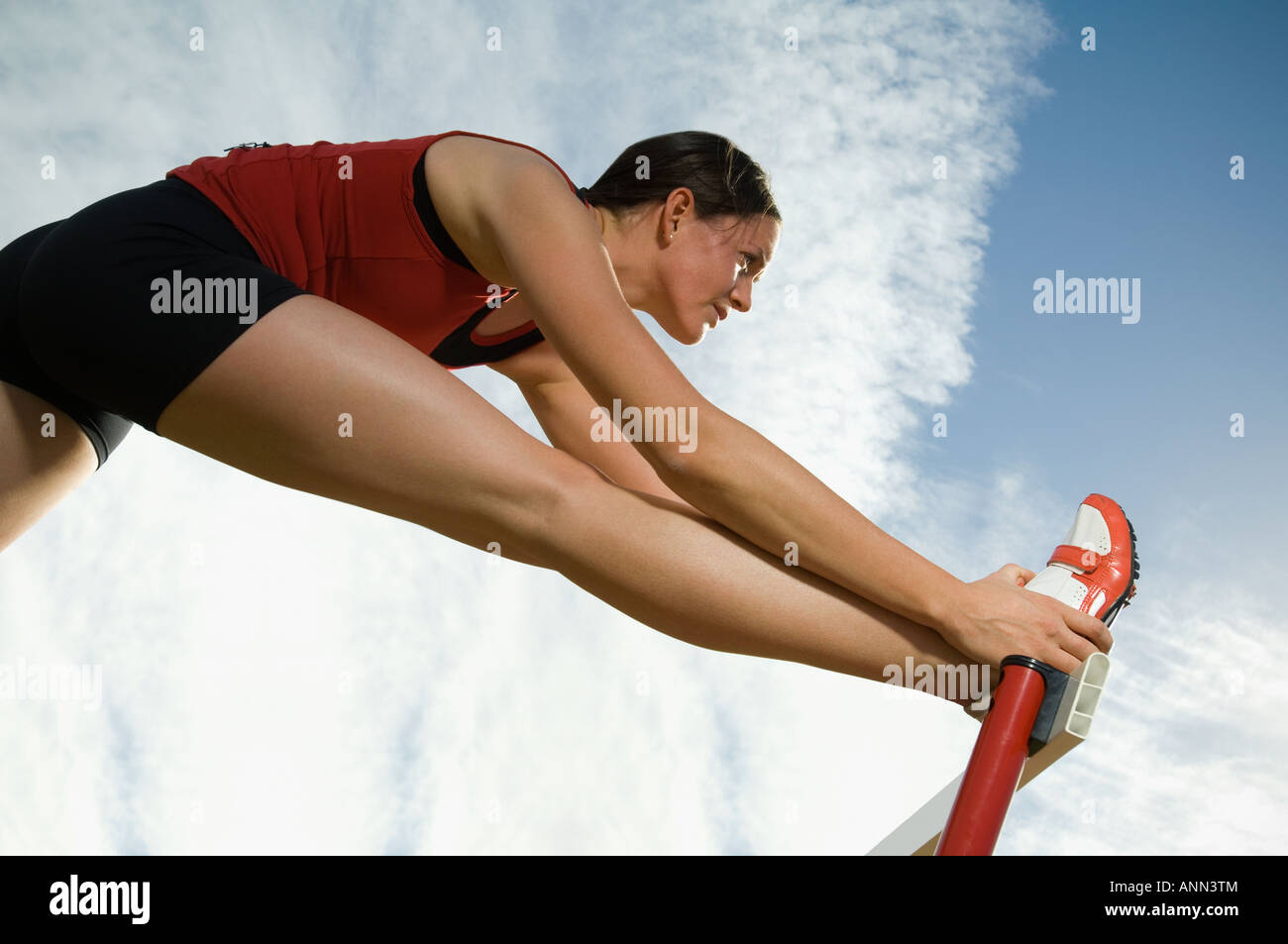 Athlete stretching hi-res stock photography and images - Alamy