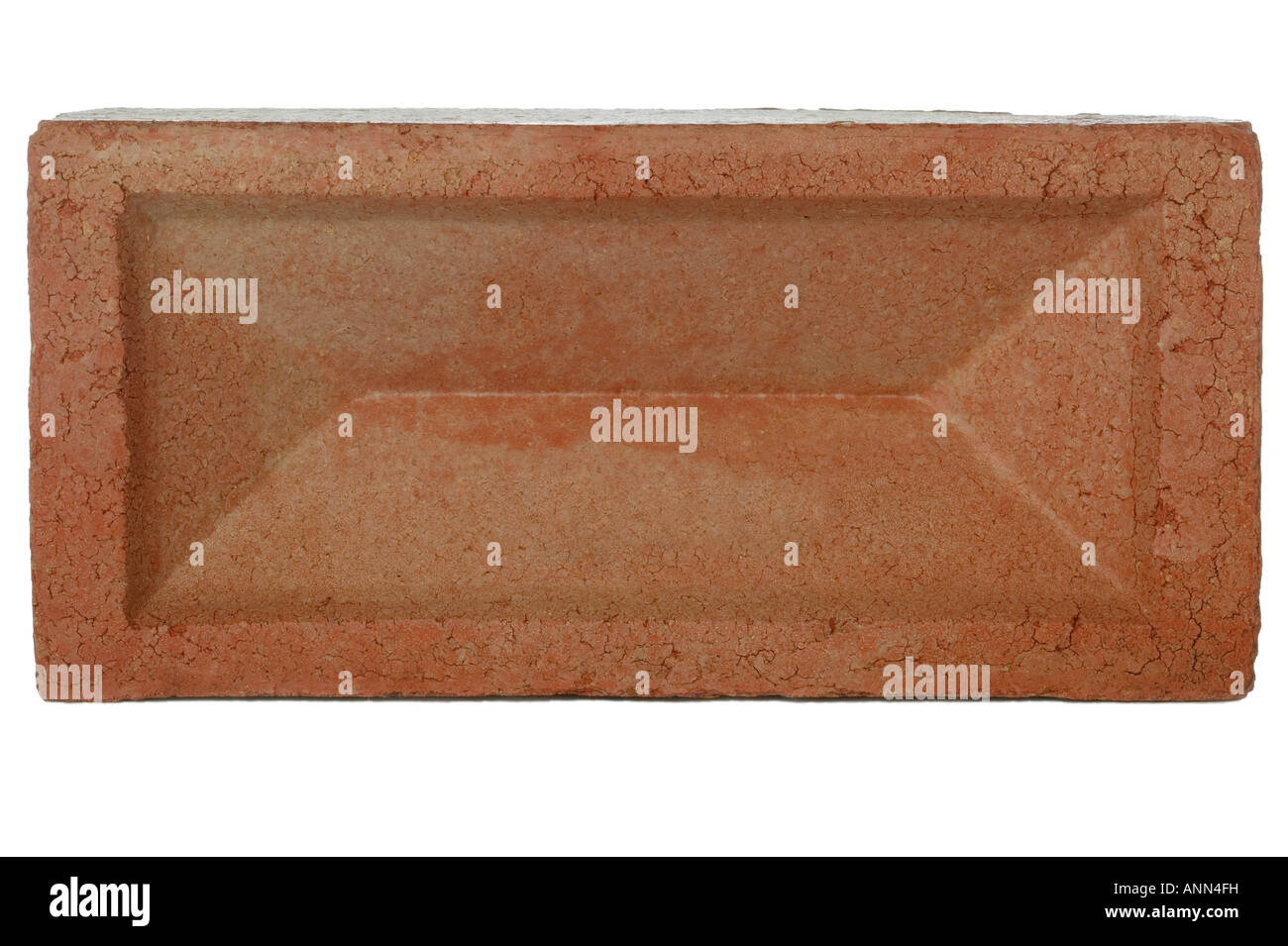 Red brick against a white background Stock Photo