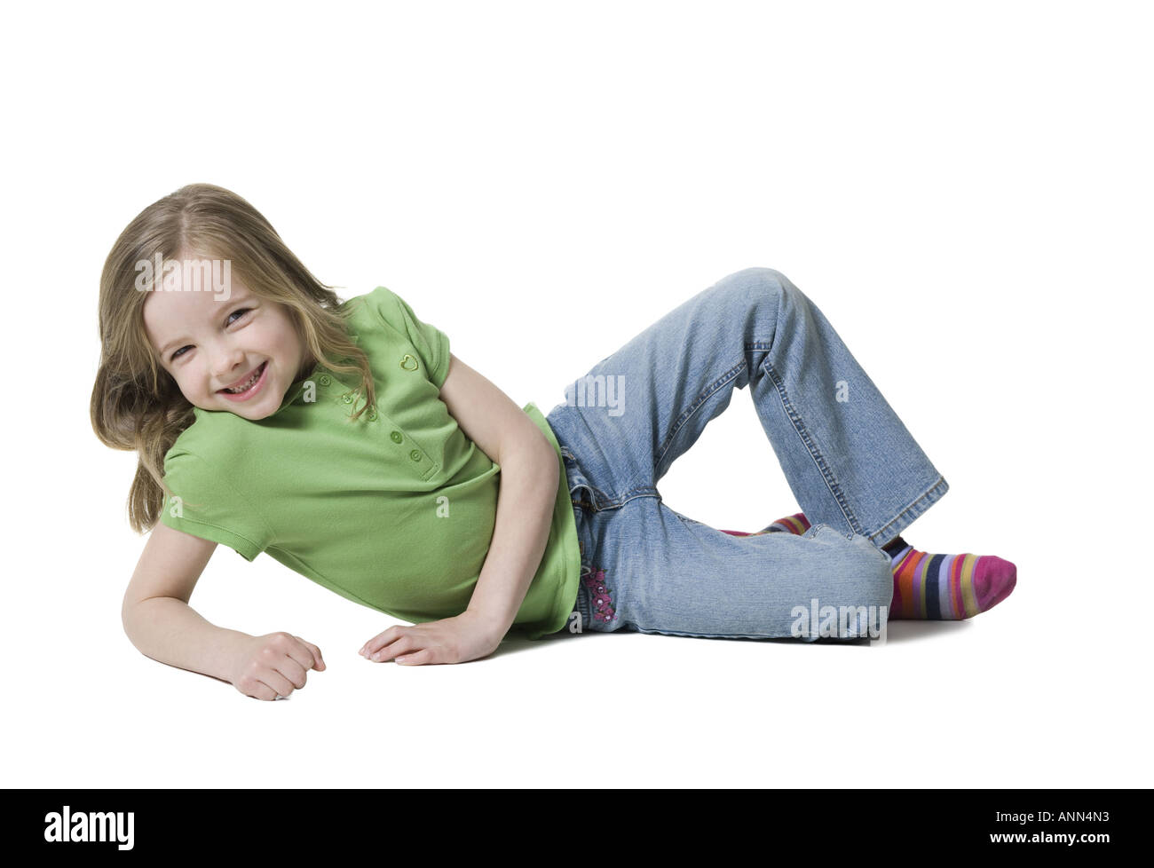 Portrait of a girl lying on the floor Stock Photo