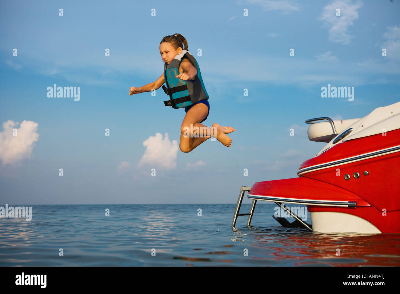 Girls jumping off boat in hires stock photography and images Alamy