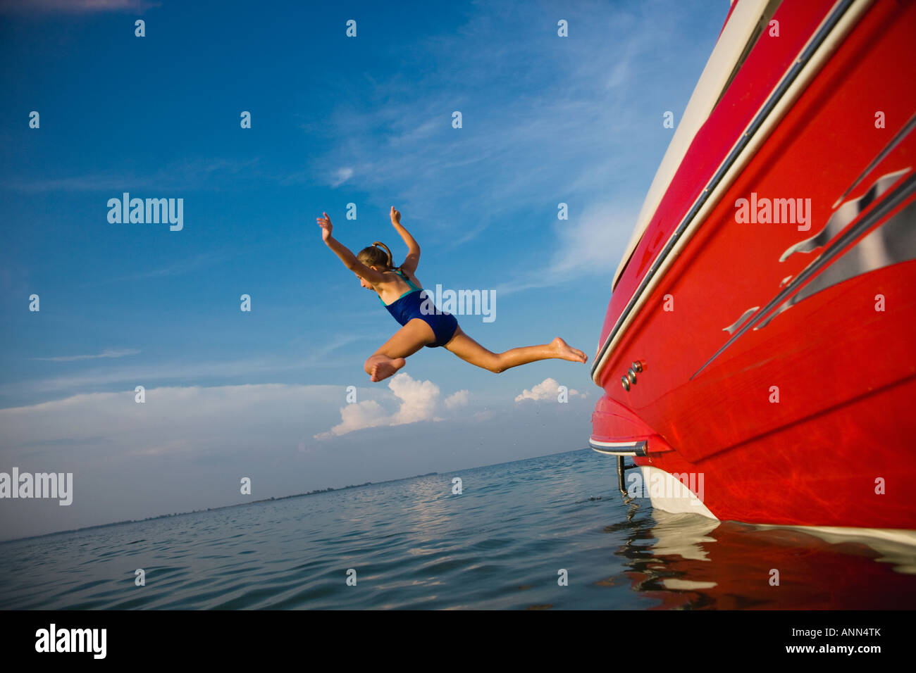Person jumping from boat hires stock photography and images Alamy