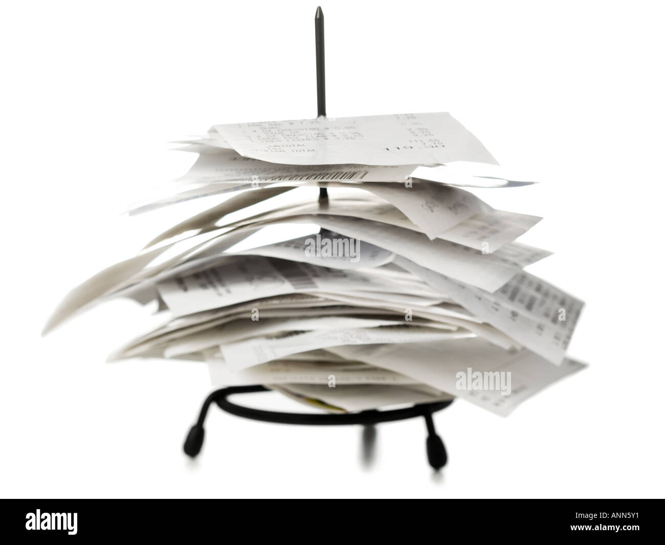 Receipts on a metal spike Stock Photo