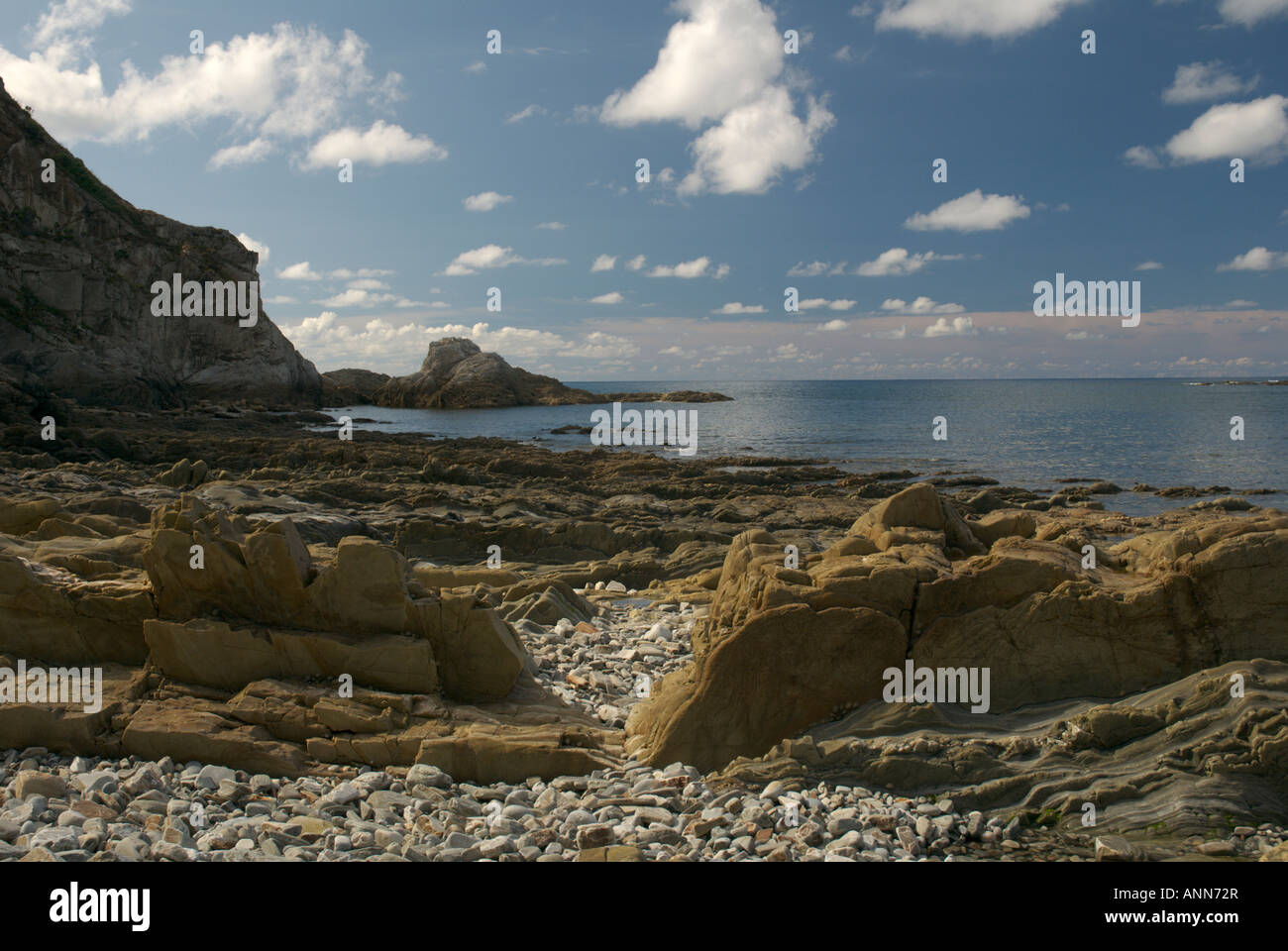 The rocky Atlantic coastline at Playa de Gairua, Santa Marina Stock Photo