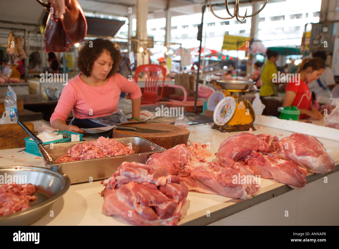 Meat seller at the market in Khon Kaen Stock Photo