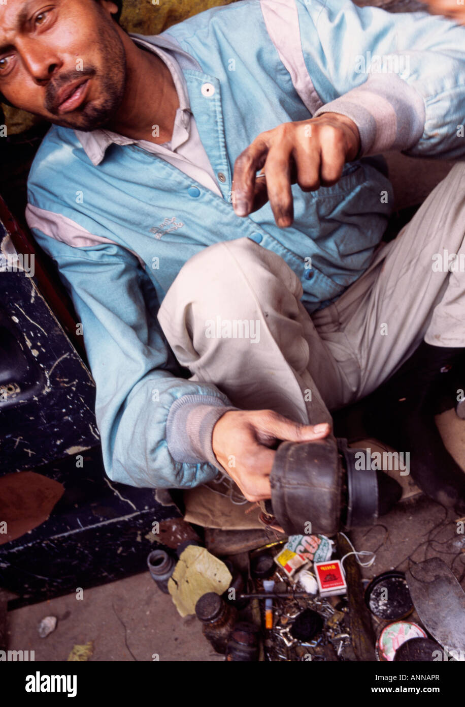 cobbler shoe repair street Delhi India Stock Photo