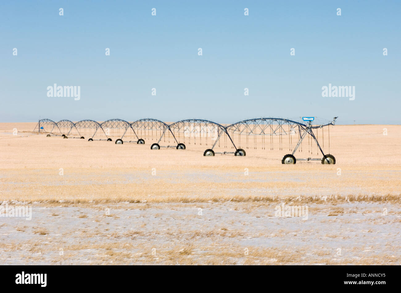 Rolling irrigation structure in snowy prairie, Carmangay, Alberta