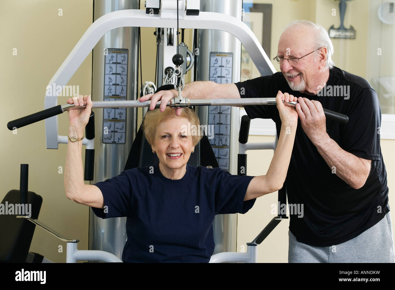 Senior couple exercising in the gym Stock Photo - Alamy