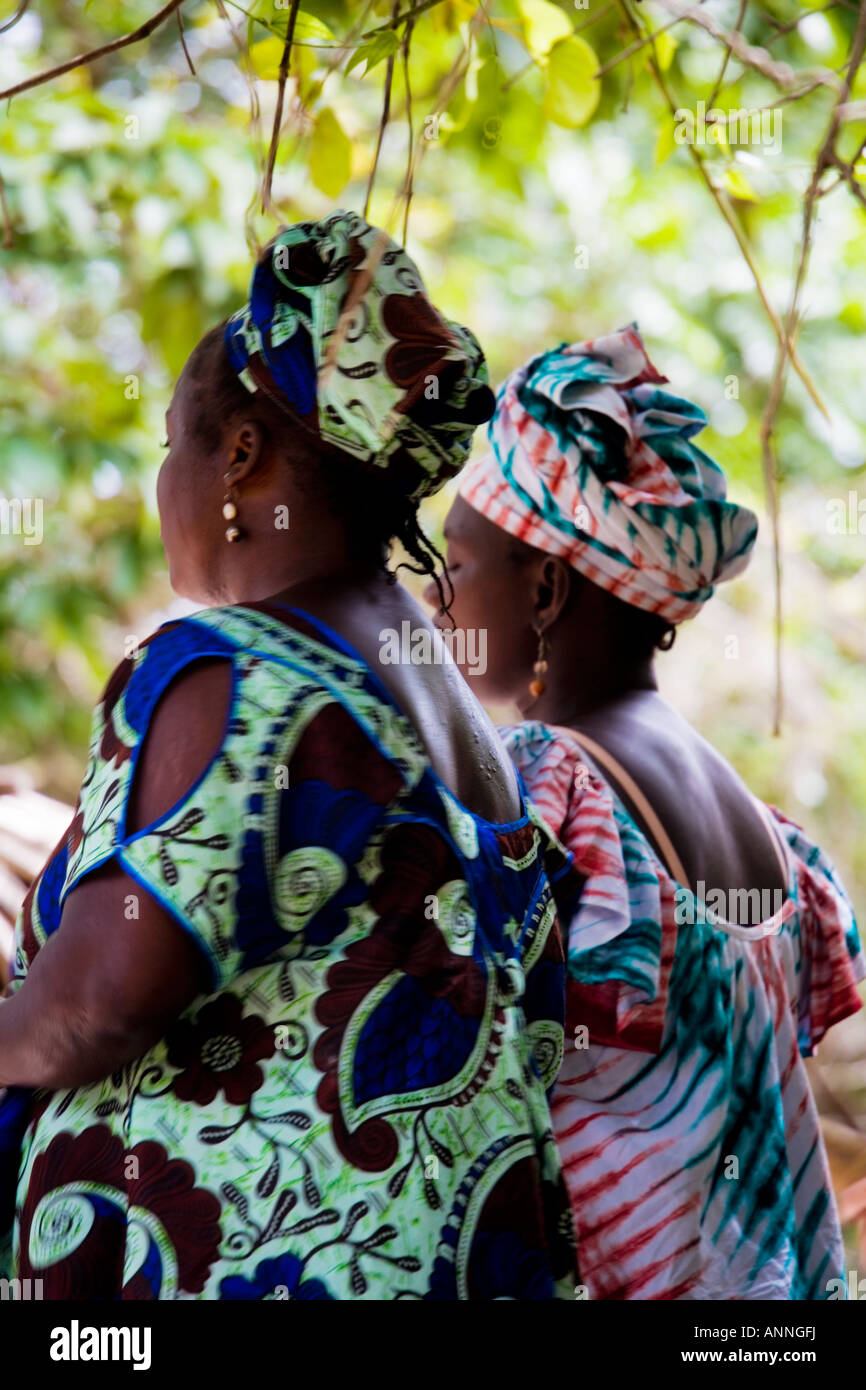 Back view of two Gambian dancers wearing Jola tribal dress at Makasutu Culture Forest, Gambia, west Africa Stock Photo