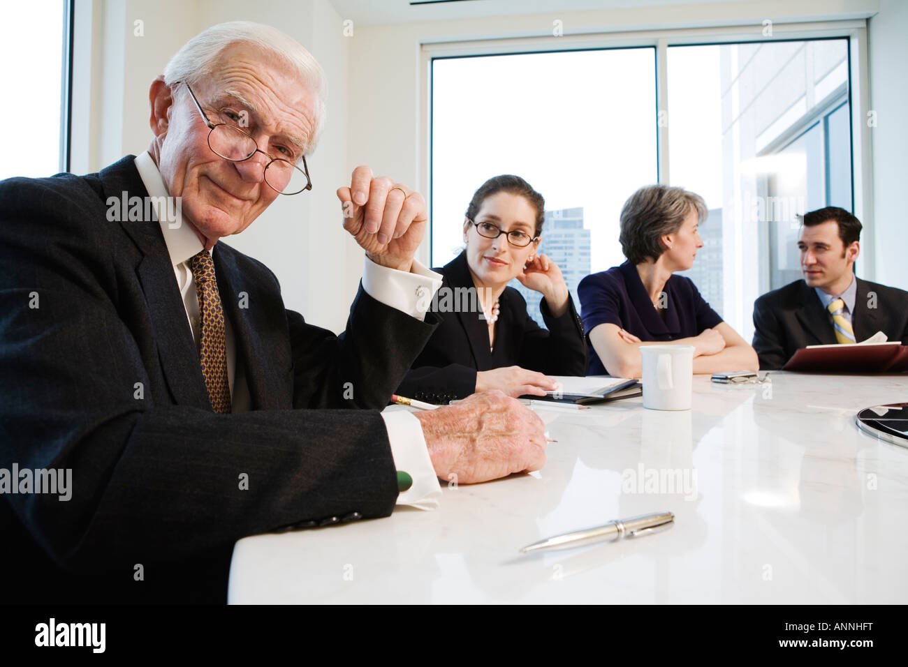 Portrait of businesspeople smiling in an office Stock Photo - Alamy
