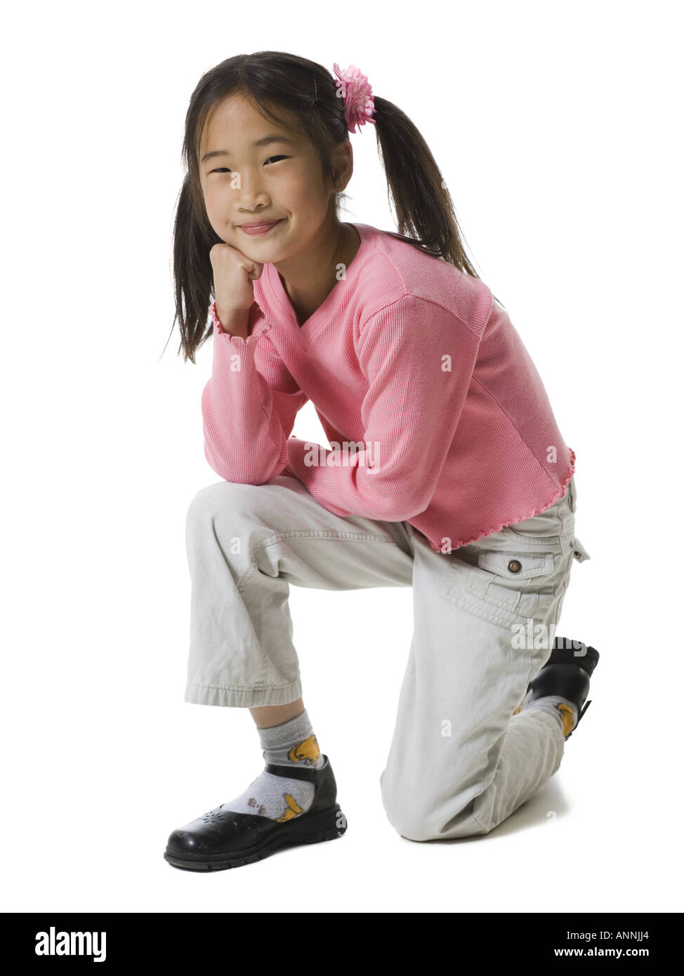 Girl kneeling silhouette hi-res stock photography and images - Alamy