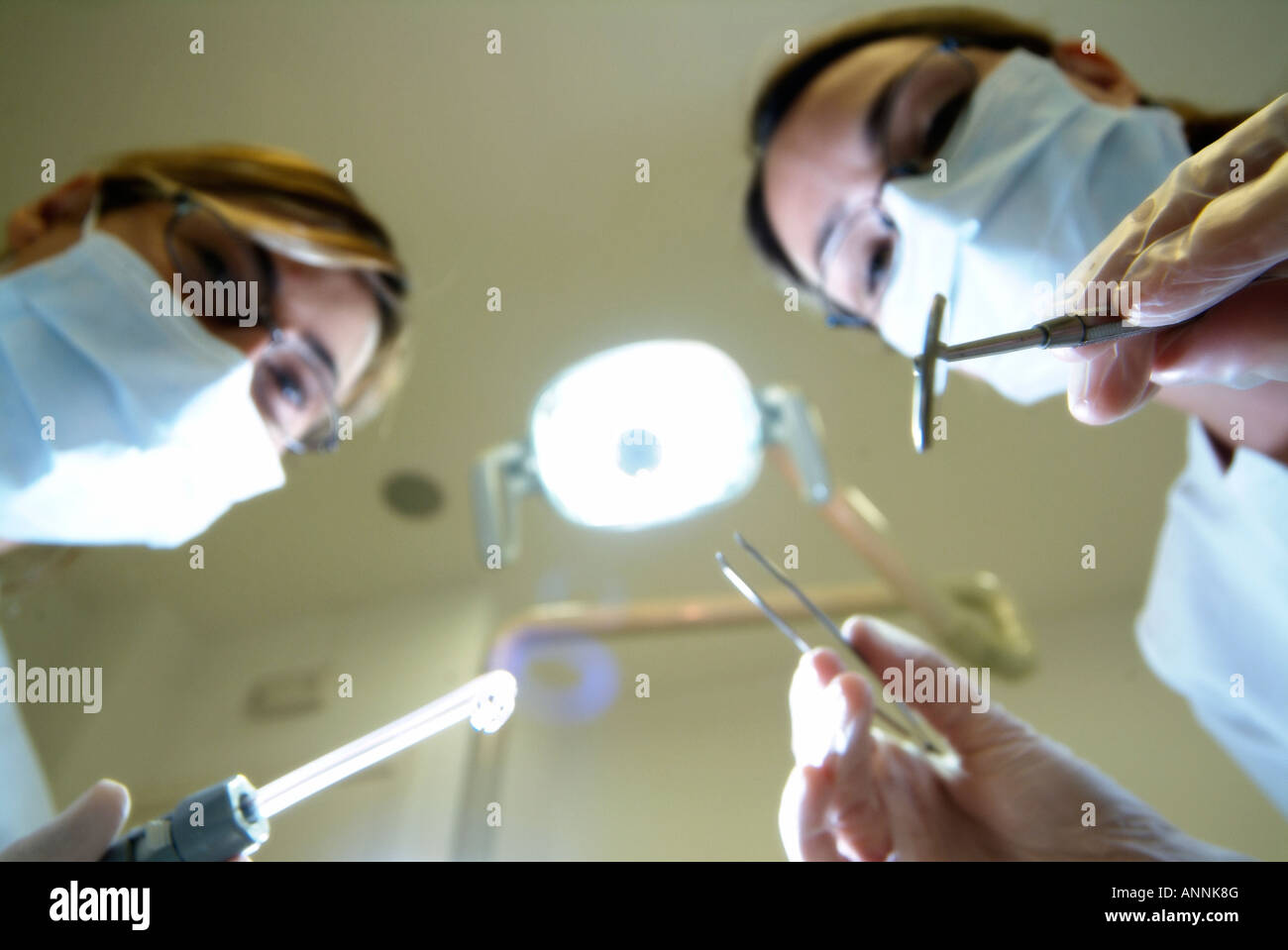 Dentist at work, seen from patient's point of view Stock Photo
