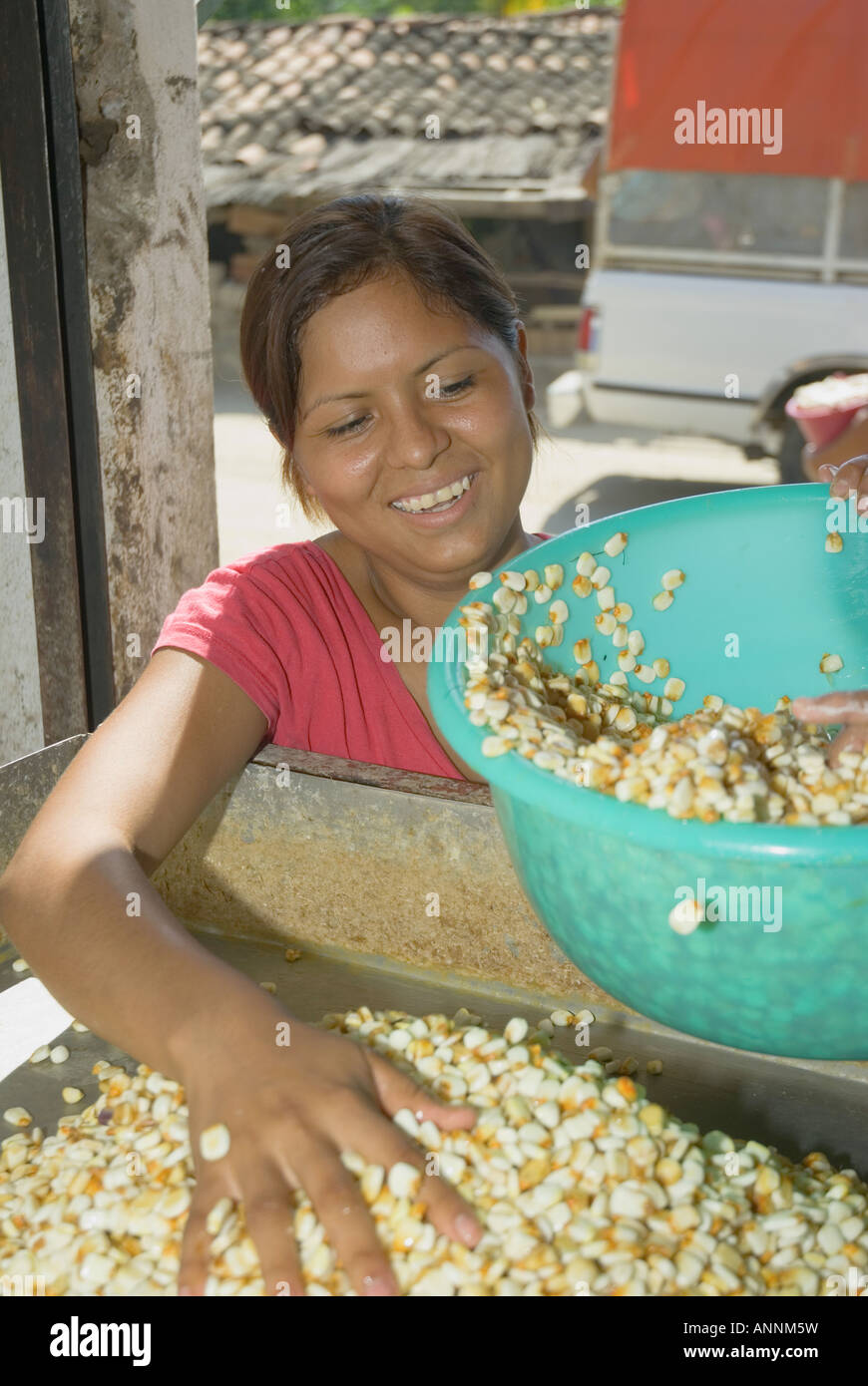 Women bring maize to the local grinding mill to get dough for use in