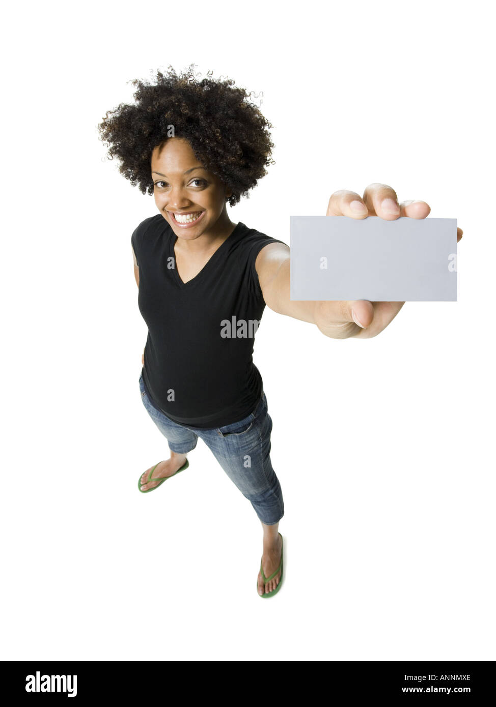 Portrait of a young woman holding a blank sign Stock Photo - Alamy