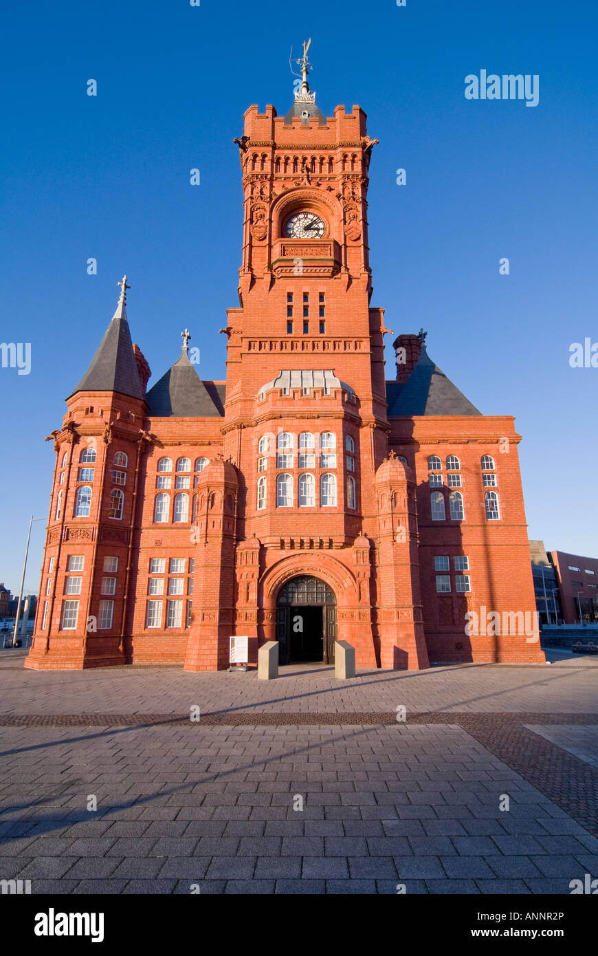 Vertical wide angle of the distinctive redbrick Pierhead Building, formerly the Bute Dock Company headquarters, in Cardiff Bay. Stock Photo