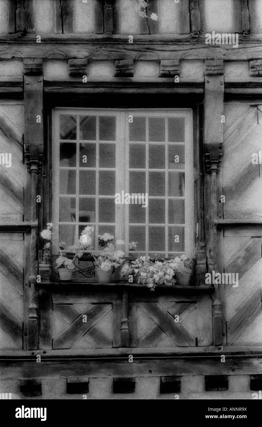 Window in Noyers,  France- taken on Kodak HIE infra-red film, Serein Stock Photo