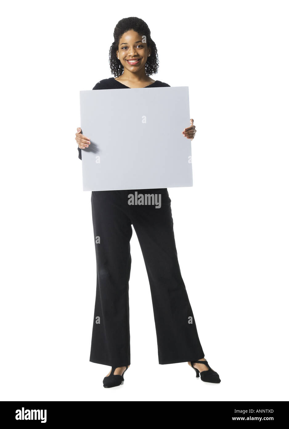 Portrait of a teenage girl holding a blank sign Stock Photo - Alamy