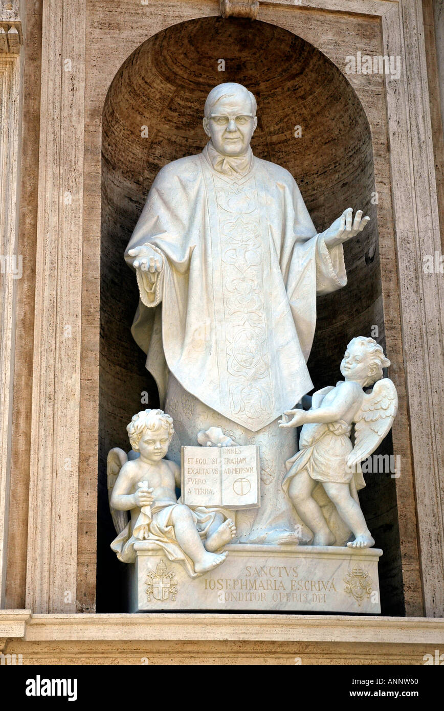 A statue of Opus Dei founder José Maria Escrivá canonised 2002 in an exterior niche of Rome's St Peter's basilica Stock Photo