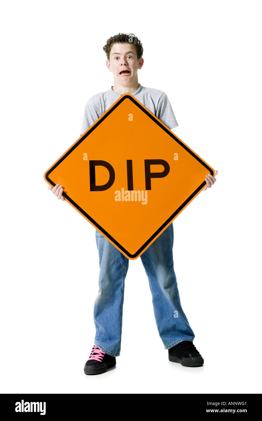 Portrait of a teenage boy holding a sign board Stock Photo - Alamy